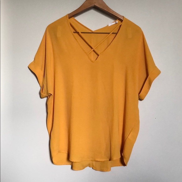yellow flowy shirt